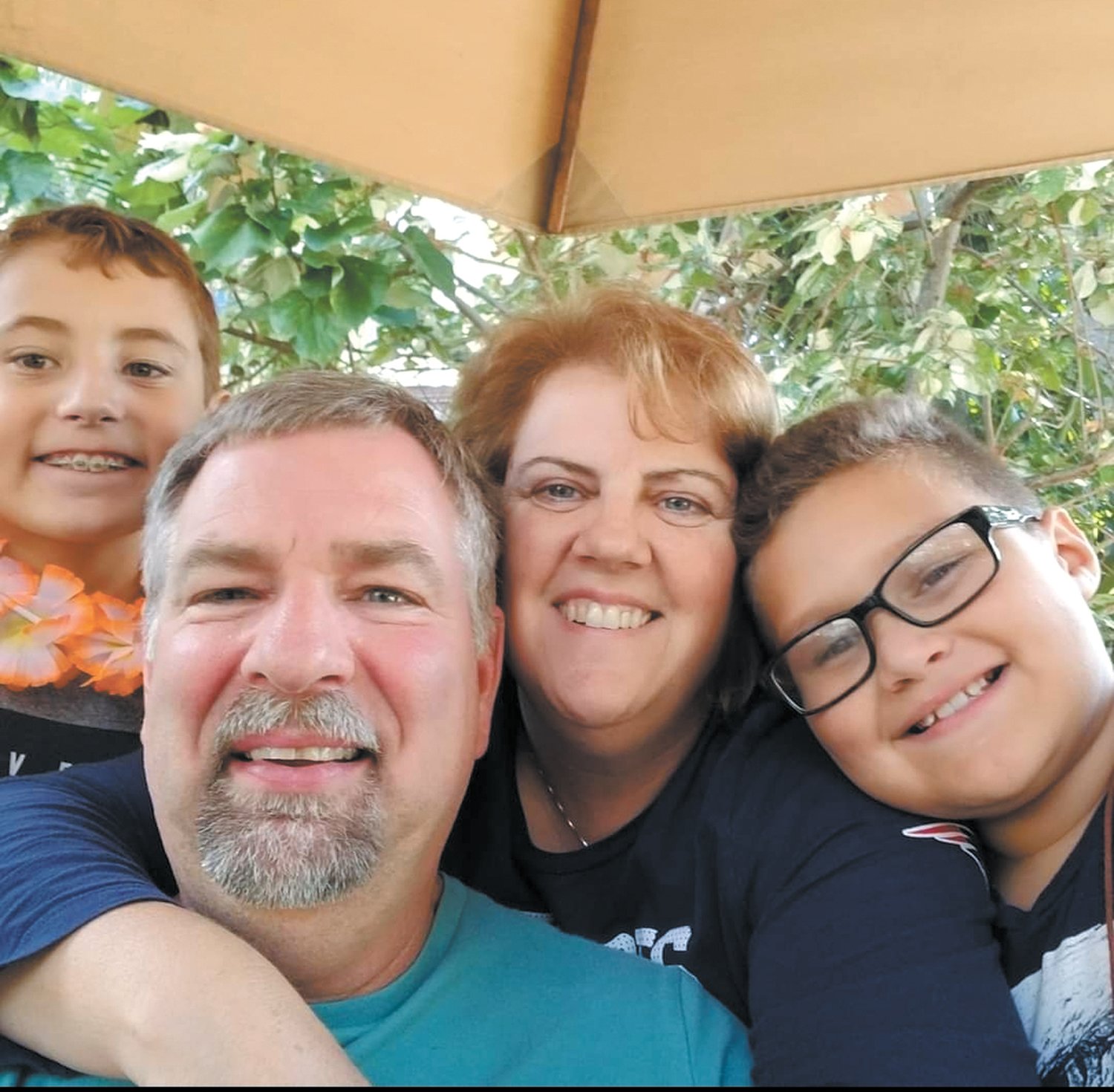ONE OF THE FOUNDERS: Kelley Fluette was one of the four foster moms who founded the Village in 2016. From left is her son Jovanni, her husband Randy, herself and her son Carlito.